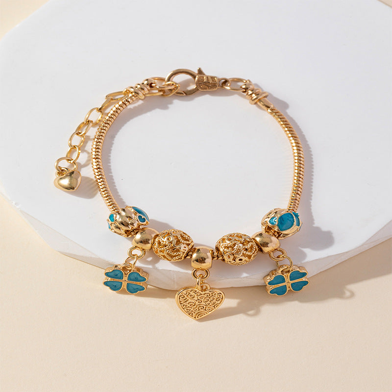 Pan Family Bracelet Dora DIY Beaded Cross-Border Hot-Selling Heart-Shaped Pendant Personality Oil-Drip Alloy Hollow Accessories Bracelet